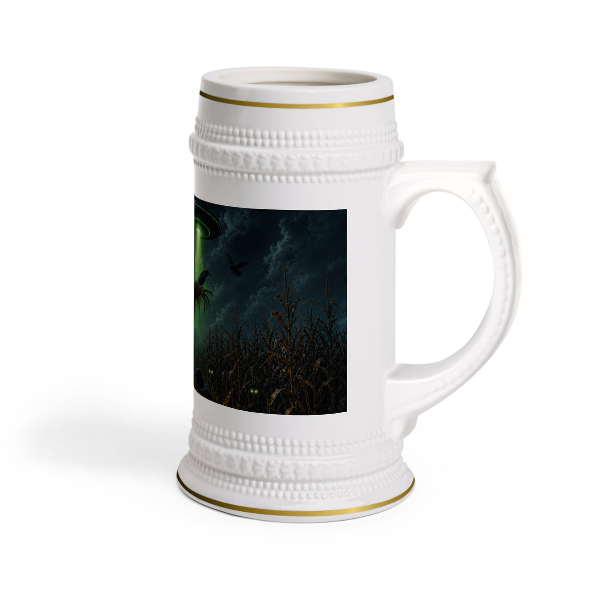 Right-side view of the white ceramic stein, showing gold trim, the curved handle and a UFO-lit cornfield illustration.